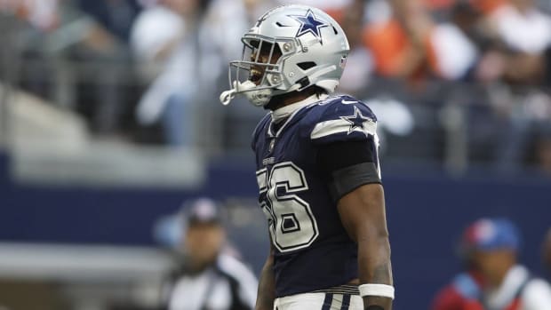 Cowboys pass rusher Dante Fowler Jr. celebrates after a sack in a game.